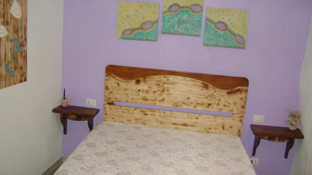 Le Pentume Apartman Arnesano Szoba fotó