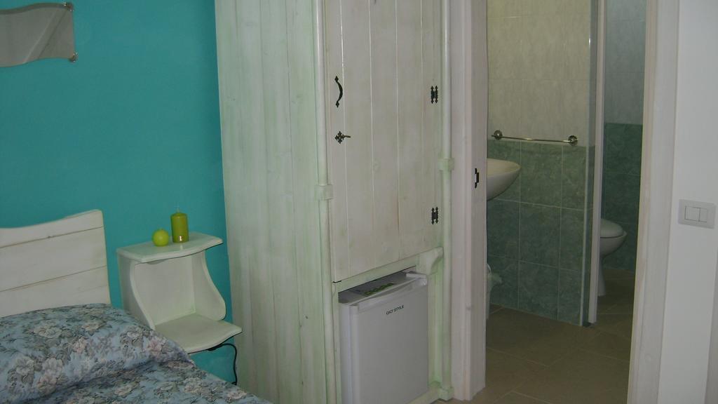 Le Pentume Apartman Arnesano Szoba fotó
